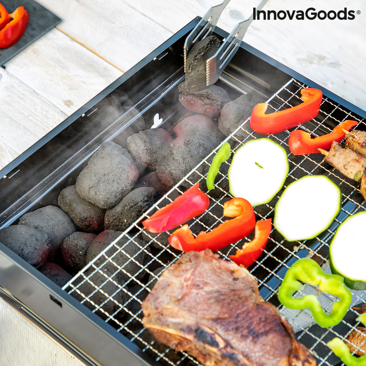 Faltbarer, tragbarer Grill zur Verwendung mit Holzkohle BearBQ InnovaGoods